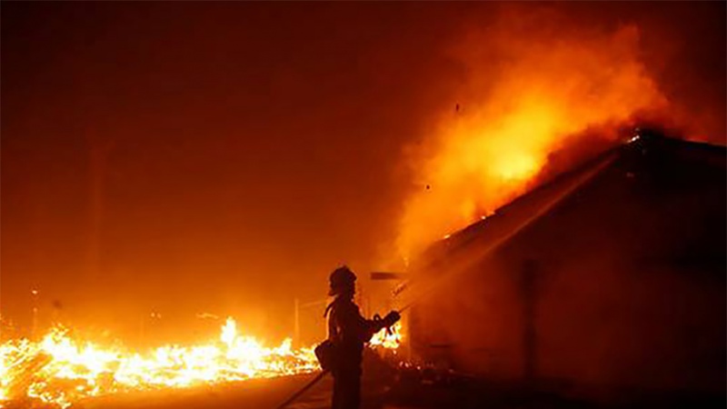 Iranpress: California wildfire: Death toll rises to 23 after 14 bodies found