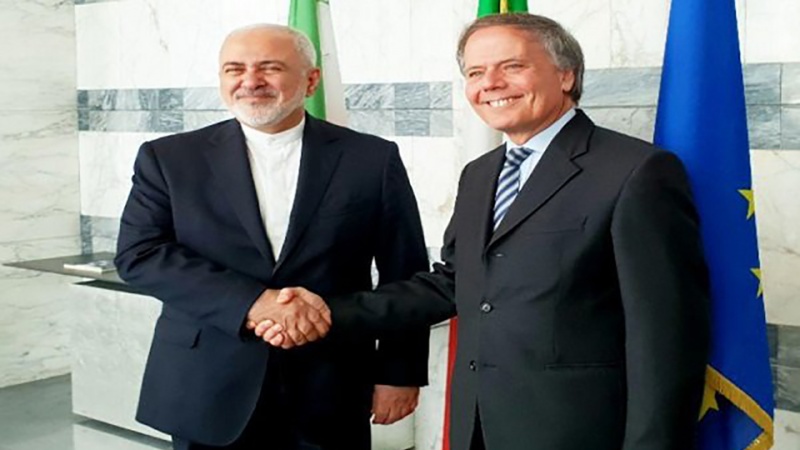 Iranpress: Zarif discusses  JCPOA, SPV with Italian counterpart