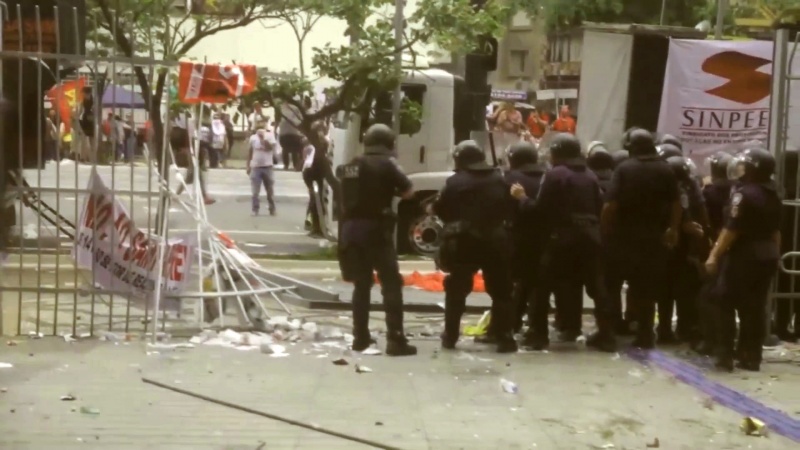 Iranpress: Police clash with protesters in Brazil