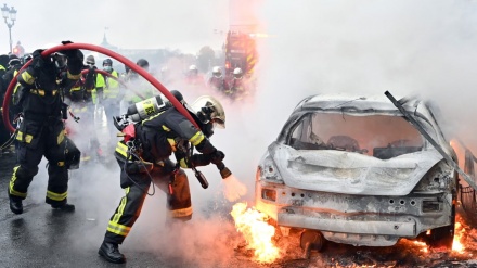 Cars torched and shops raided as ‘gilets jaunes’ protest turns violent in Paris