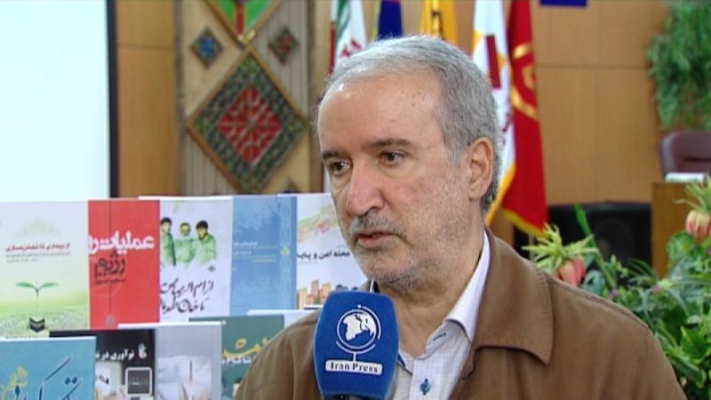Iranpress: 12 thousand book titles published about sacred defense: Iranian author