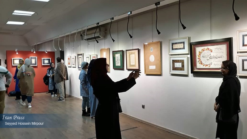 Iranpress: Photo: Mashhad hosts the Nasta?l?q calligraphy exhibition