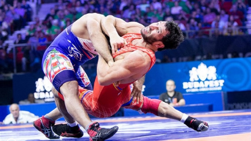Iranpress: إيران تفوز بلقب وصافة بطل العالم للمصارعة الرومانية في كازاخستان
