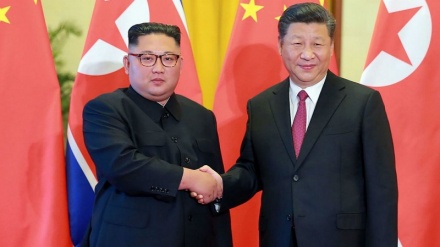 North Korea describes ties with China as 'invincible'