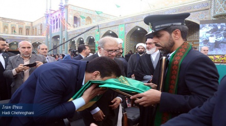Changing of flag ceremony held at Hazrat Masoumeh Holy Shrine in Qom