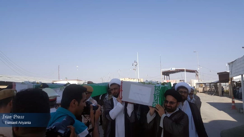 Iranpress: إعادة جثامين عشرات الشهداء من العراق إلى أرض الوطن