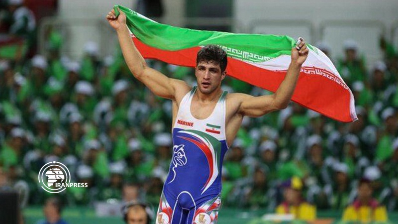 Iranpress: Iranian wrestler wins gold in 2019 Military World Games