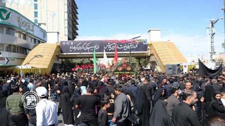 Photo: mourners march in the holy city of Mashhad to mark Arbaeen