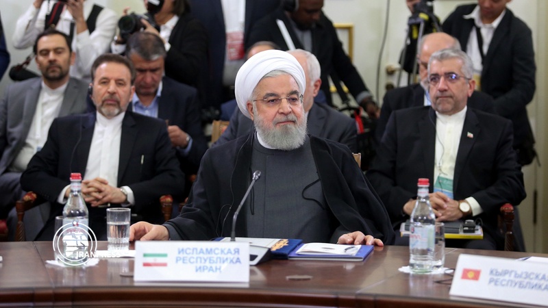 Iranpress: الرئيس روحاني: على المجتمع الدولي مواجهة نهج أمريكا العدائي 