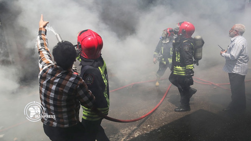 Iranpress: Fire at Arvand Free Trade Zone market under control