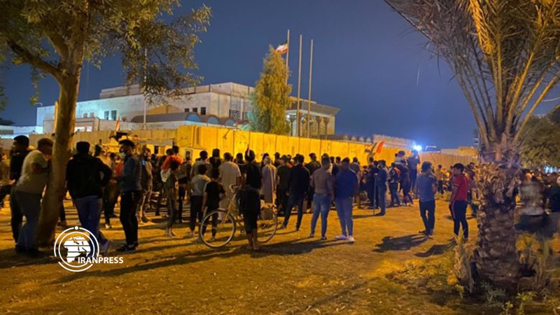 Iranpress: Unknown people gather outside Iranian mission in Iraq