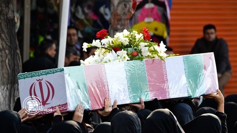 Iranpress: People attend funeral of martyred Policeman in Kermanshah