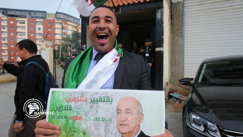 Supporter reacts at the campaign headquarters of Abdelmadjid Tebboune after he was announced as the new president, in Algiers, Algeria December 13, 2019<br>
 