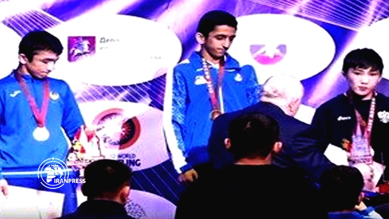 Iranpress: Iran snatch gold, bronze in Moscow U15 wrestling tournament