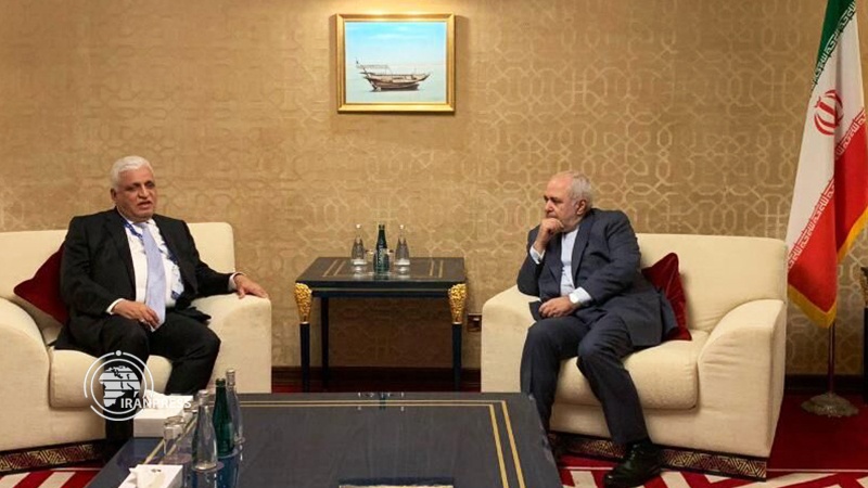 Iranpress: Iraqi National Security Advisor meets Iranian FM Zarif in Doha