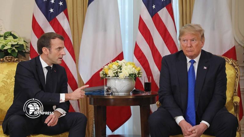 Iranpress: French President refuses to back down after Trump attack