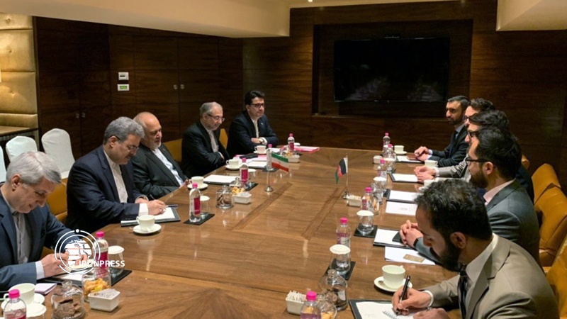 Iranpress: Iranian FM, Afghan National Security advisor meet in India