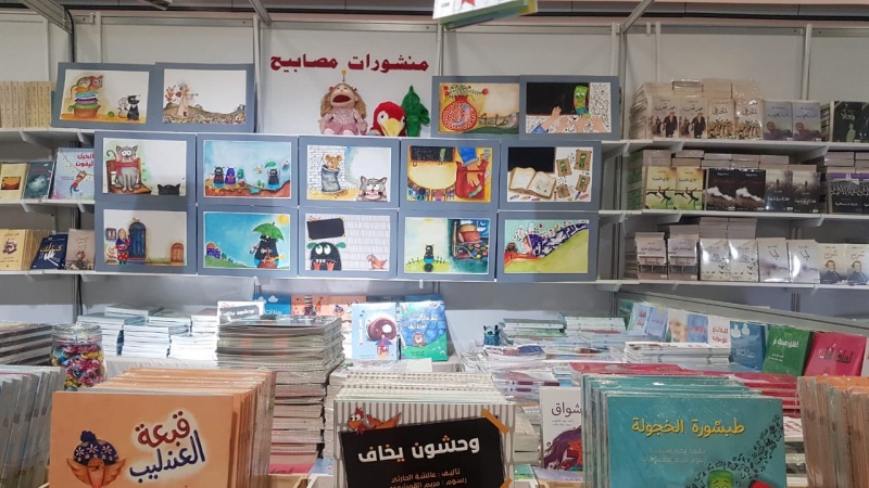 Iranpress: إيران تشارك بفاعلية في المعرض الدولي للكتاب بمسقط