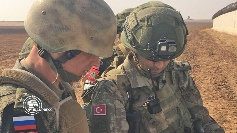 Iranpress: Russia, Turkey begin joint patrols on Syrian highway