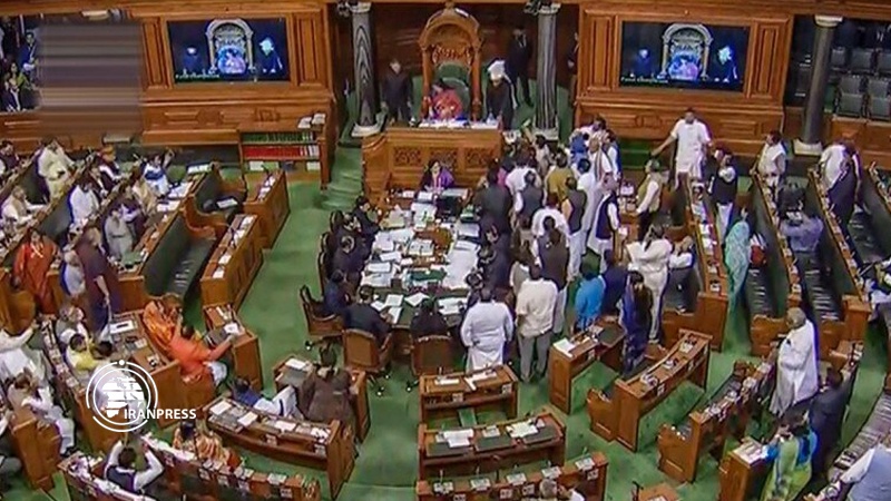 Iranpress: Indian Parliament session interrupted