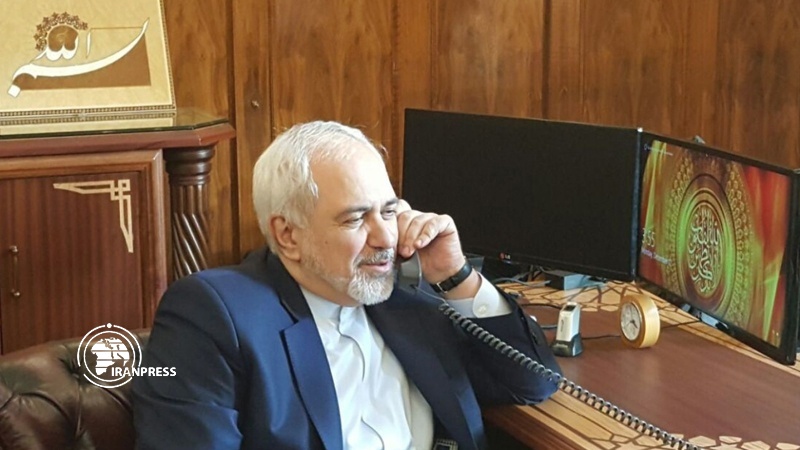 Iranpress: محادثات هاتفية لوزيري الخارجية الإيراني والبريطاني حول فيروس كورونا