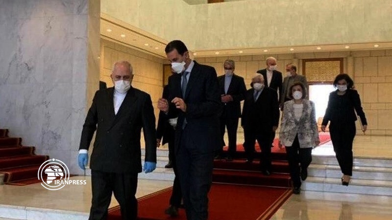 Iranpress: Zarif meets Bashar al-Assad, Walid al-Muallem