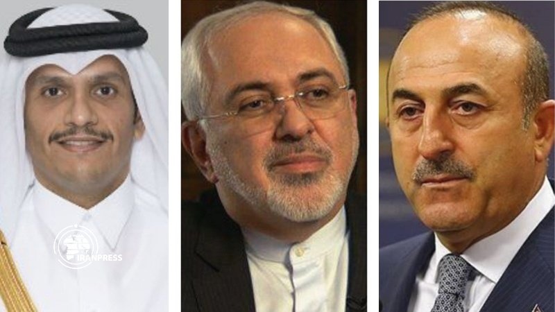 Iranpress: ظريف يبحث الأزمة في أفغانستان مع وزيري خارجية تركيا وقطر