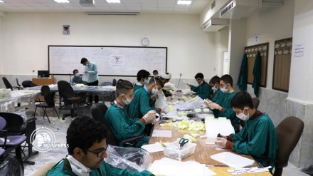 Iran's student Basij members produce 5,000 face shields in Holy Mashhad