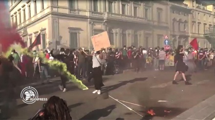 Italian protesters against racism and injustice burn US flag in Florence 