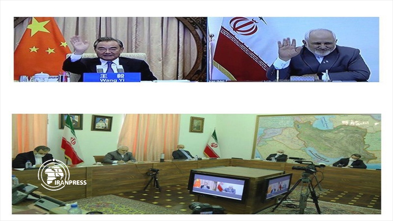 Iranpress: Iranian, Chinese FMs discuss developments in bilateral ties