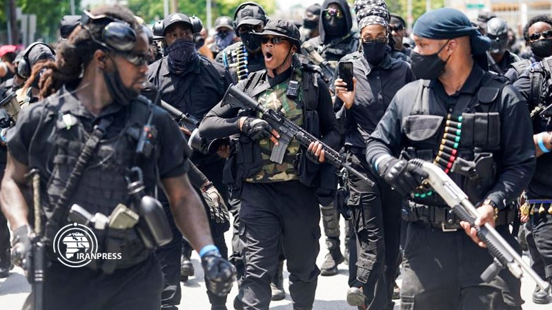 Iranpress: Heavily armed black protesters march in Kentucky against racial injustice