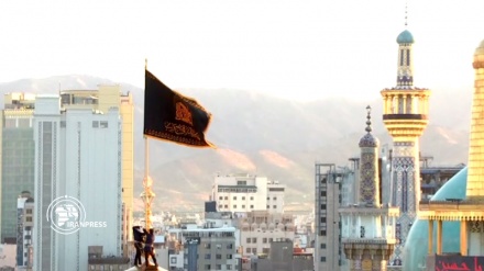 Start of Muharram rituals at Imam Reza holy shrine by changing flag
