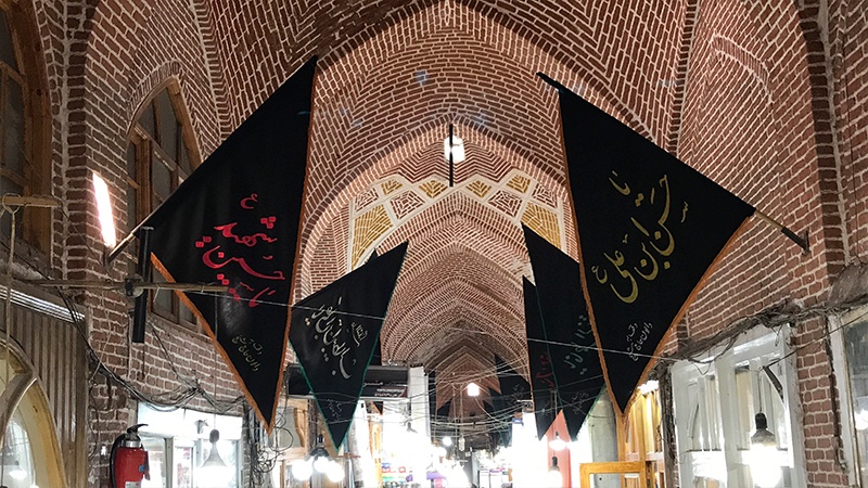 Imam Hossein mourning flags raised at world largest indoor market/Photo by Vahid Pourrazavi