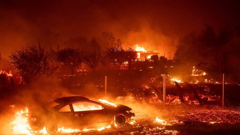 Iranpress: California wildfires torch area bigger than Rhode Island 