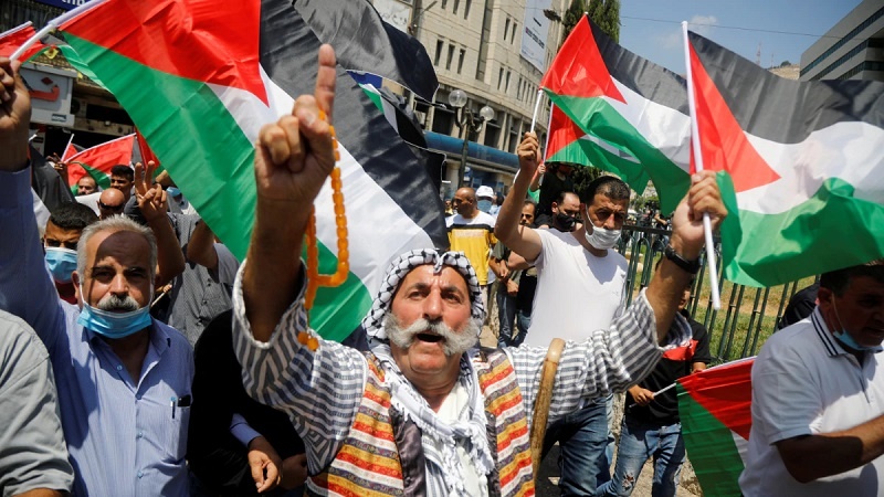Palestinians took part in a protest against UAE-Isreal agreement in Nablus, West Bank PHOTO: By Reuters
