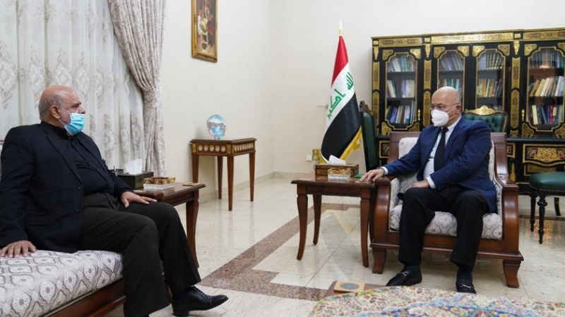 Iranpress: السفير الإيراني لدى بغداد يلتقي الرئيس العراقي