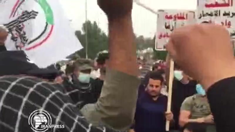 Iranpress: الاحتجاجات في العراق ضد التواجد الأمريكي في البلاد 