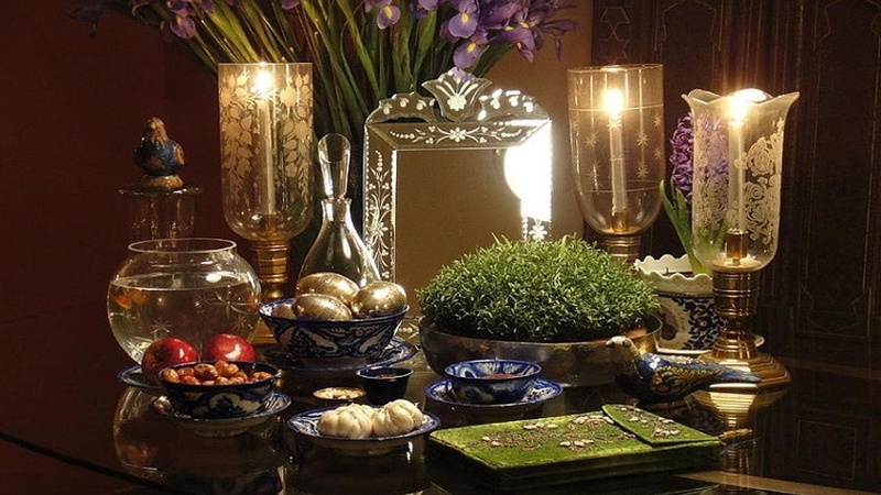 Iranpress: الإيرانيون يحتفلون بالربيع بمائدة السينات السبع