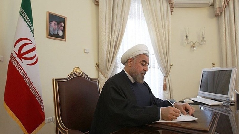 Iranpress: الرئيس روحاني يهنئ سوريا بيومها الوطني