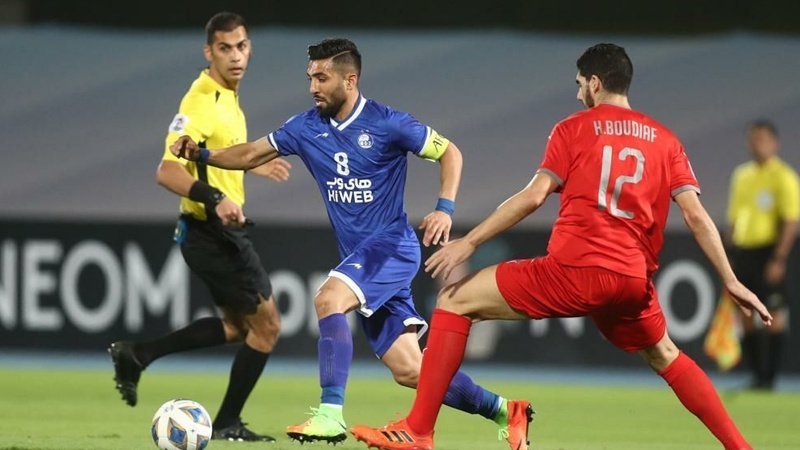 Iranpress: إستقلال طهران يتعادل مع الدحيل القطري في دوري أبطال آسيا 2021