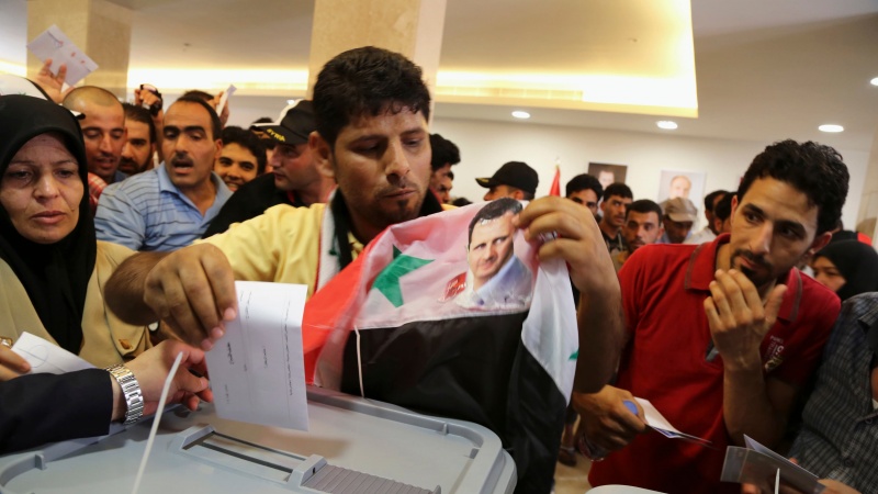 Iranpress: روسيا تؤكد أن الانتخابات في سوريا تنطبق مع الشرعية الدولية