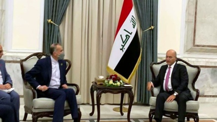 وزير الخارجية الإيراني يلتقي الرئيس العراقي