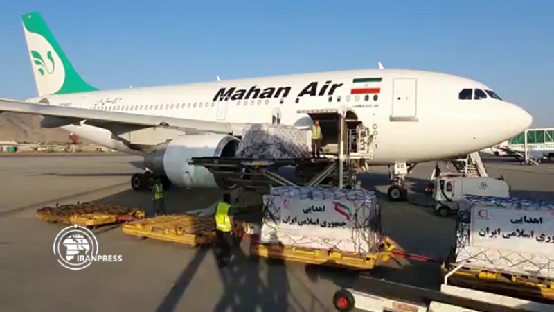 Iranpress: وصول الشحنة الثالثة من المساعدات الإنسانية الإيرانية إلى أفغانستان