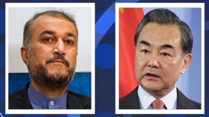 Iranpress: وزيرا الخارجية الإيراني والصيني يناقشان العلاقات الثنائية