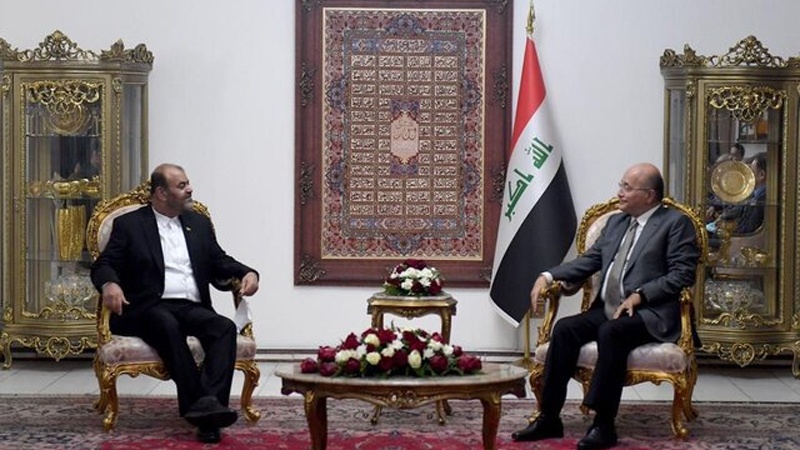 Iranpress: وزير الطرق الإيراني يلتقي الرئيس العراقي