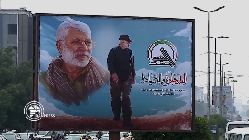 Iranpress: الكتابة على الجدران في بغداد إحياء لذكرى شهداء قادة نصر