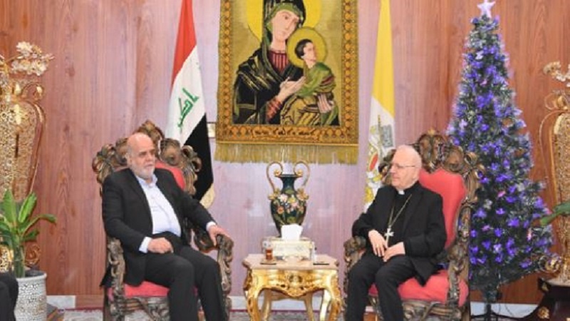 Iranpress: السفير الإيراني في بغداد يلتقي البطريرك الكلداني