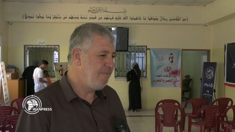Iranpress: مؤسسة "شهيد" الايرانية توزع مساعدات على عوائل الشهداء في قطاع غزة 