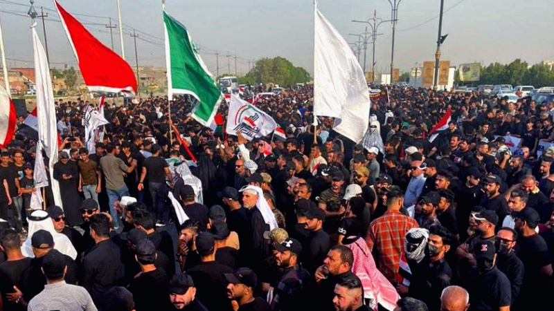 Iranpress: تظاهرات في بغداد ومناطق عراقية أخرى لدعم الشرعية