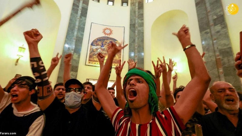 Iranpress: صور عن هجوم أنصار مقتدى الصدر على مقر منظمة بدر